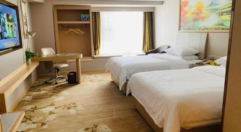 Bed in Vienna Hotel Yunnan Chunrong Street Qicai Yunan