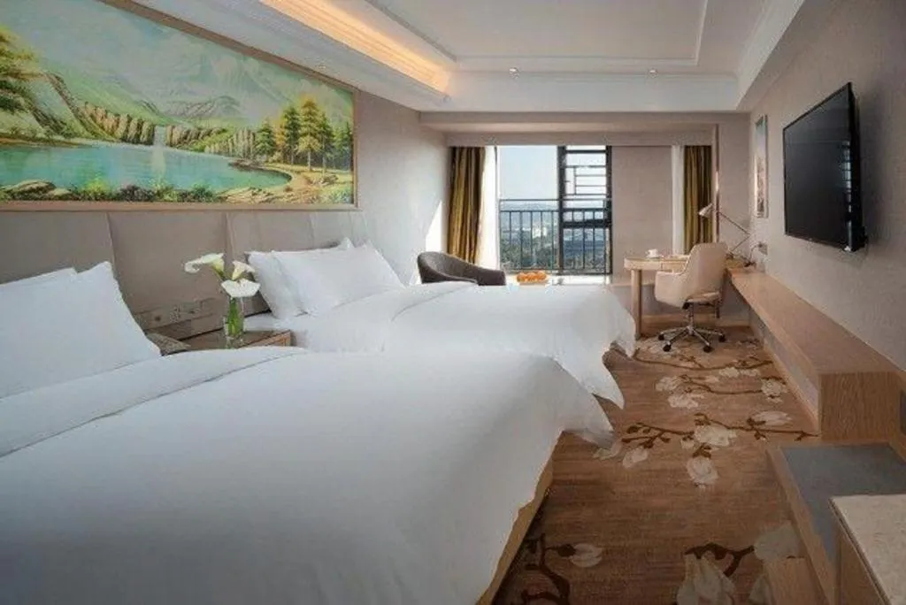 Bed in Vienna Hotel Yunnan Chunrong Street Qicai Yunan