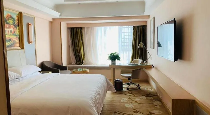 Bed in Vienna Hotel Yunnan Chunrong Street Qicai Yunan