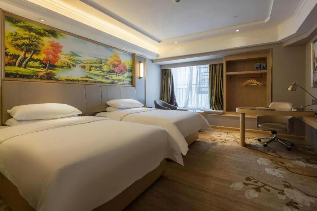 Bed in Vienna Hotel Yunnan Chunrong Street Qicai Yunan