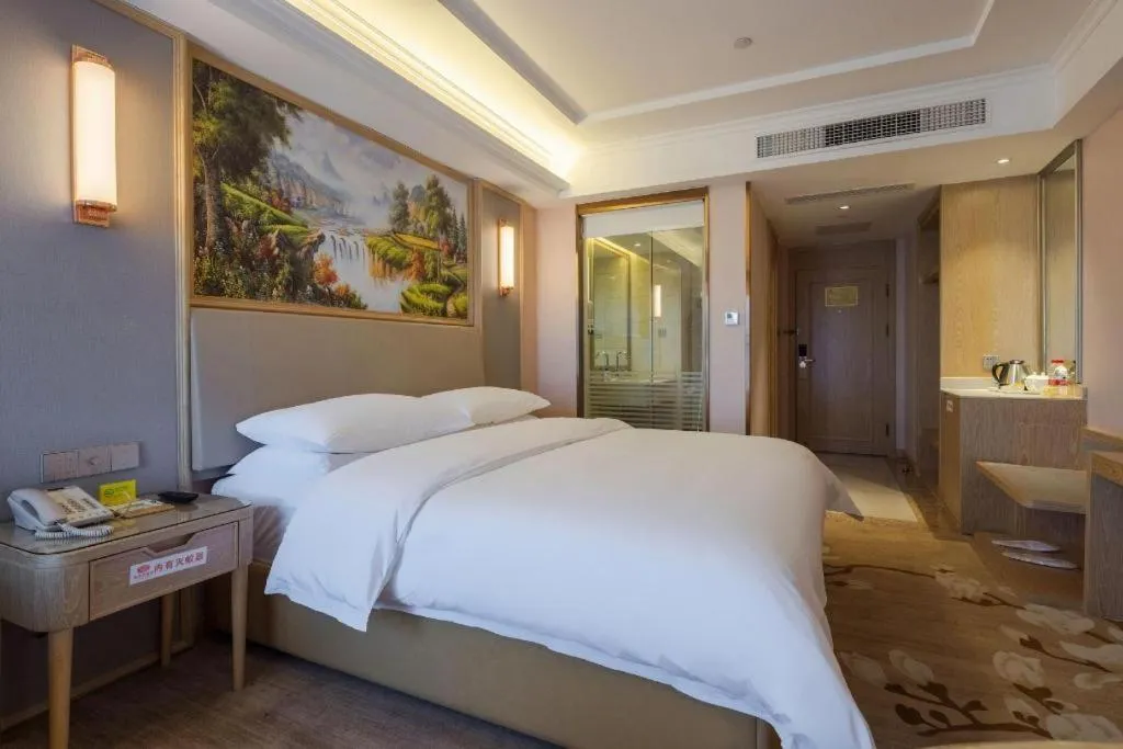 Bed in Vienna Hotel Yunnan Chunrong Street Qicai Yunan