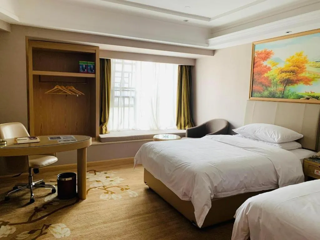 Bed in Vienna Hotel Yunnan Chunrong Street Qicai Yunan