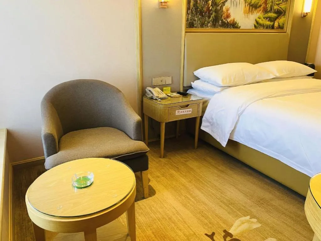 Bed in Vienna Hotel Yunnan Chunrong Street Qicai Yunan