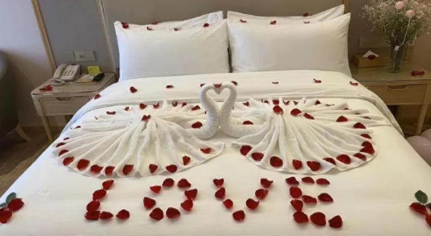 Bed in Vienna Hotel Yunnan Chunrong Street Qicai Yunan