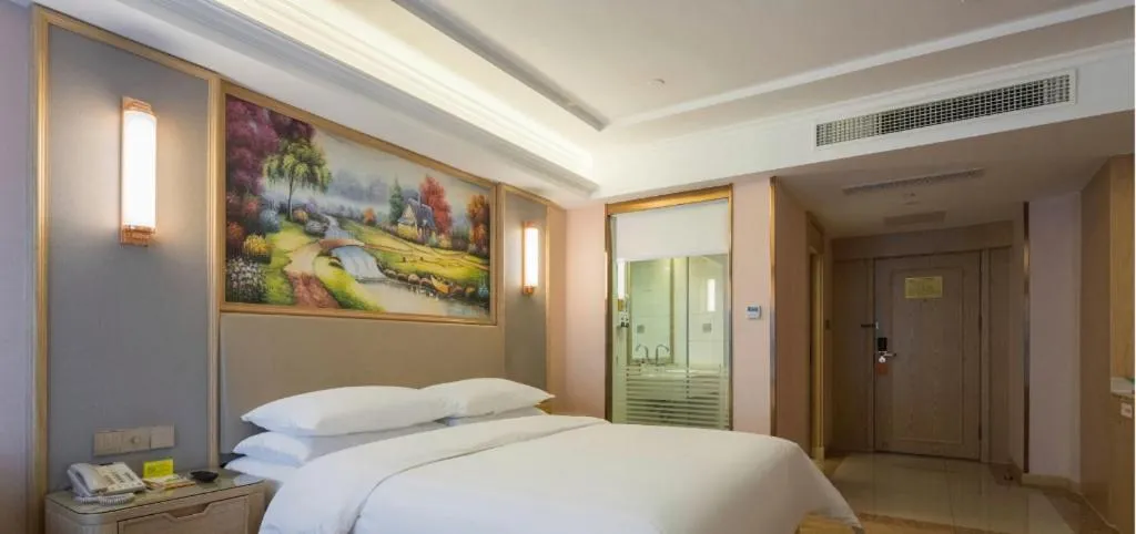 Bed in Vienna Hotel Yunnan Chunrong Street Qicai Yunan