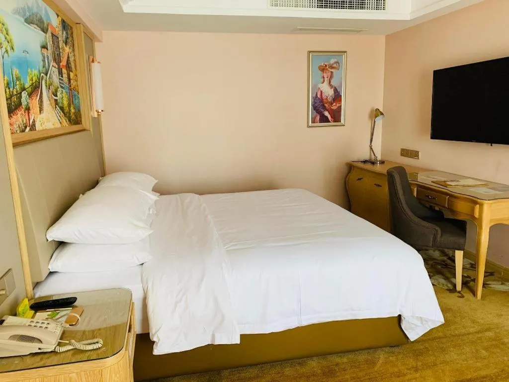 Bed in Vienna Hotel Yunnan Chunrong Street Qicai Yunan