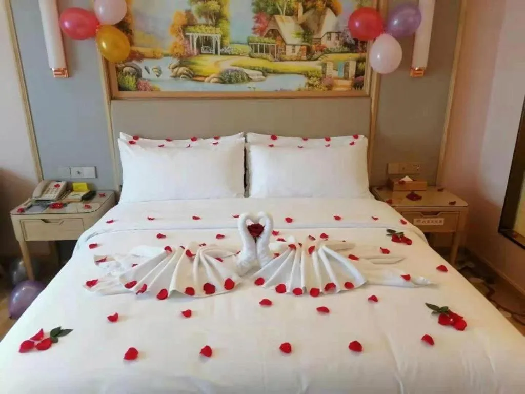 Bed in Vienna Hotel Yunnan Chunrong Street Qicai Yunan