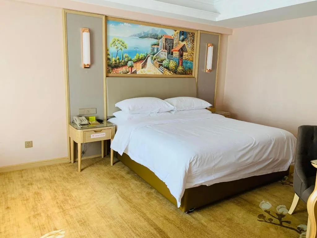 Bed in Vienna Hotel Yunnan Chunrong Street Qicai Yunan