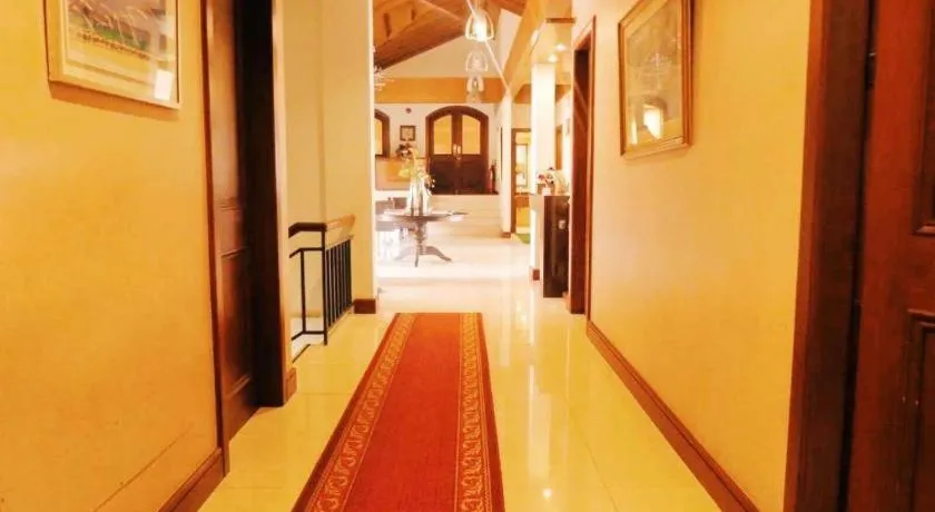 Bed in Country Chateau Hotel