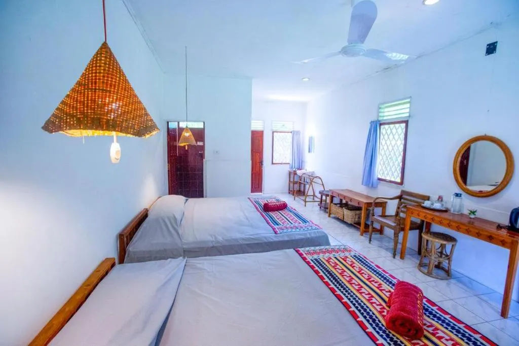 Bed in Satwa Elephant Eco Lodge