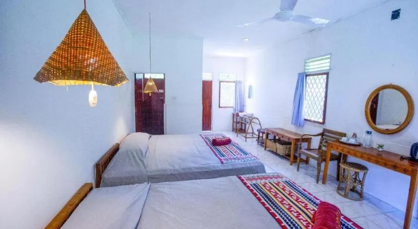 Bed in Satwa Elephant Eco Lodge