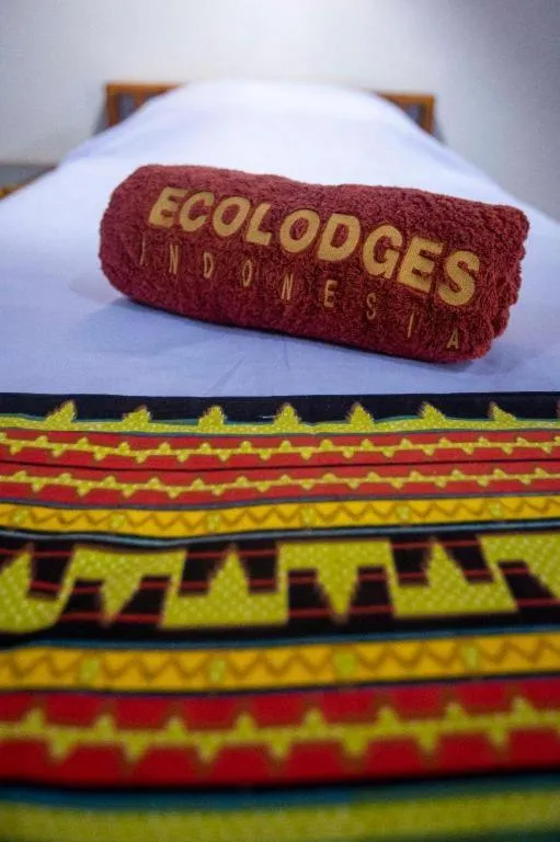 Bed in Satwa Elephant Eco Lodge