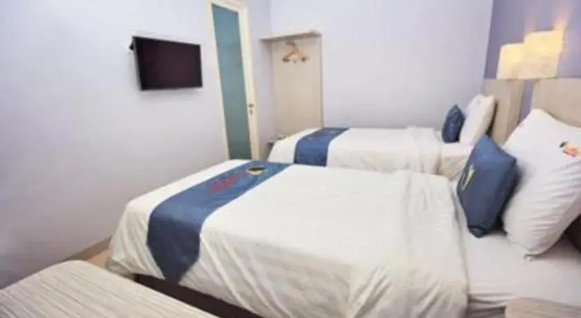 Bed in Graha Cempaka Boutique Hotel Bed in Graha Cempaka Boutique Hotel