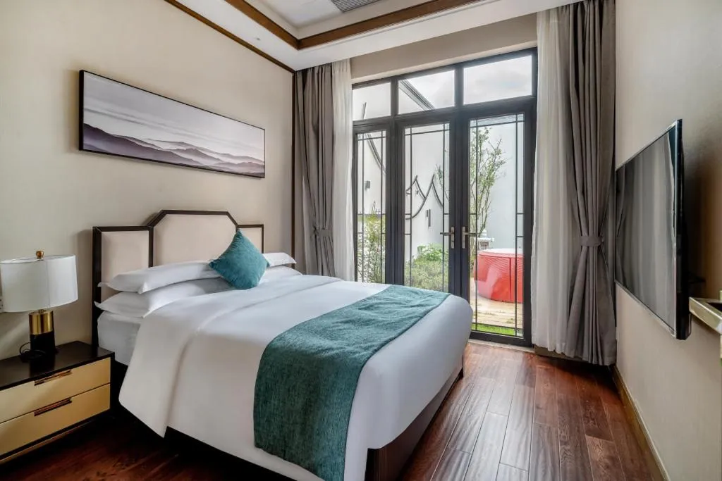 Bed in Poltton International Service Apartment Fujian Changtai Mayangxi