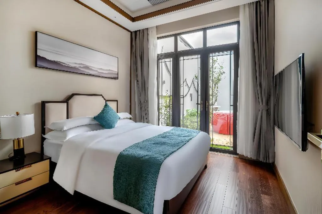 Bed in Poltton International Service Apartment Fujian Changtai Mayangxi