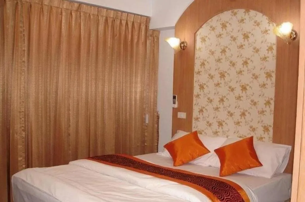 Bed in Diamond Sweet Hotel