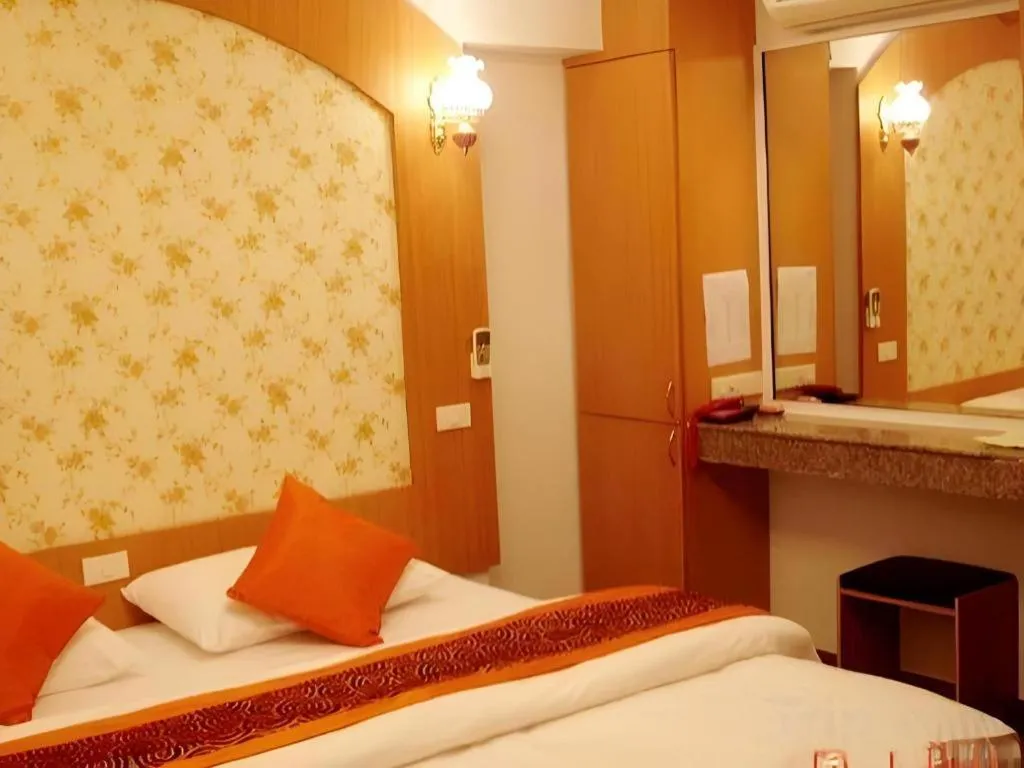 Bed in Diamond Sweet Hotel