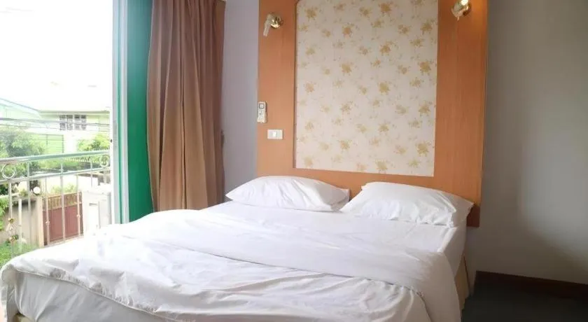 Bed in Diamond Sweet Hotel