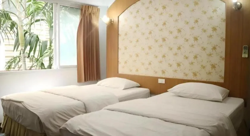 Bed in Diamond Sweet Hotel