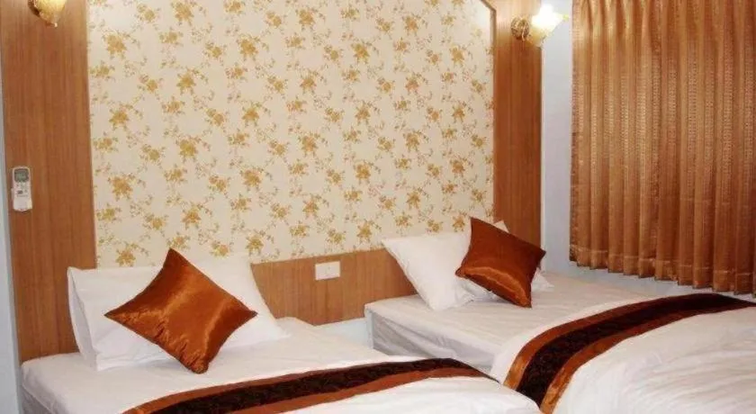 Bed in Diamond Sweet Hotel