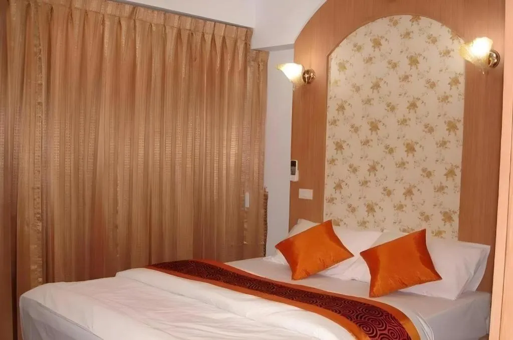 Bed in Diamond Sweet Hotel