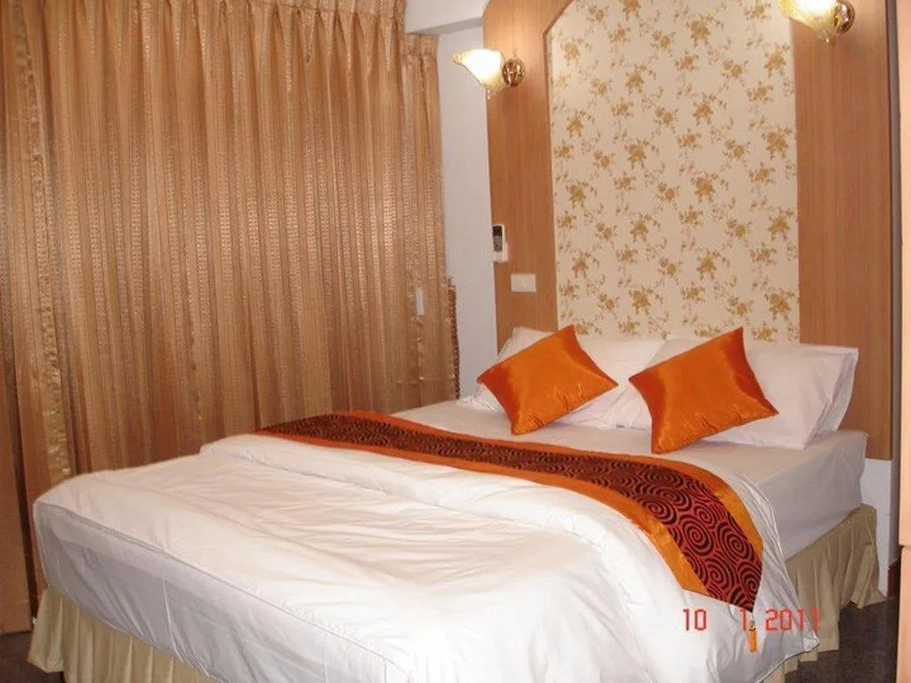 Bed in Diamond Sweet Hotel