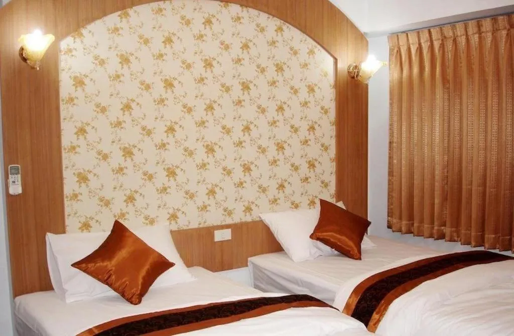 Bed in Diamond Sweet Hotel