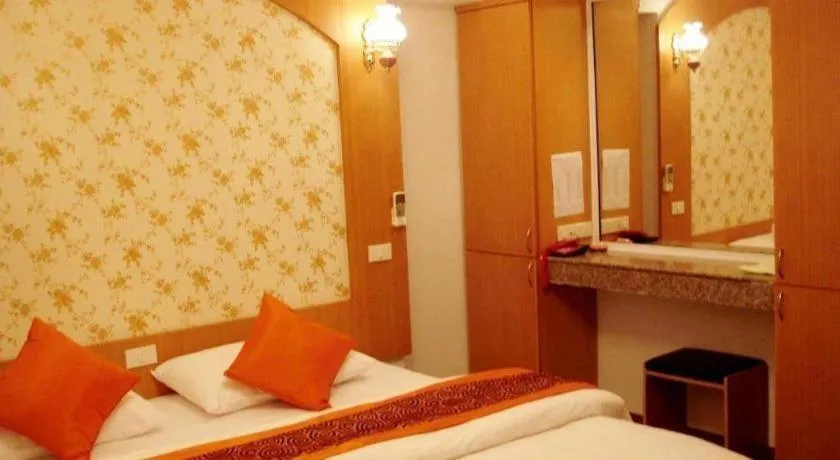 Bed in Diamond Sweet Hotel