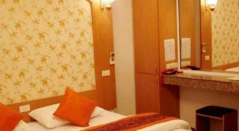 Bed in Diamond Sweet Hotel