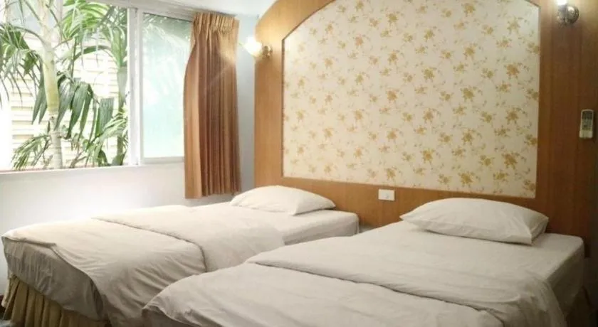 Bed in Diamond Sweet Hotel