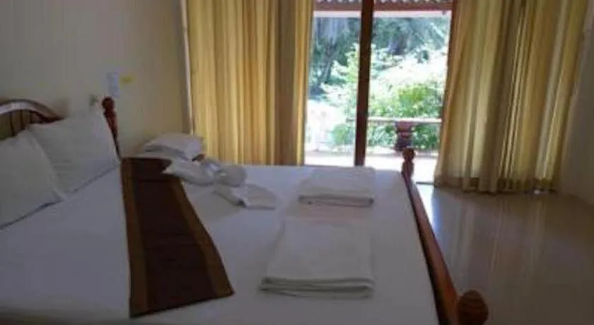 Bed in River Park Resort