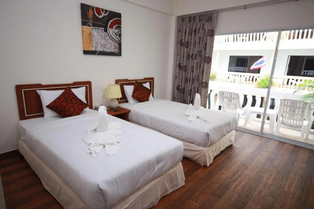 Bed in Paisiri Hotel