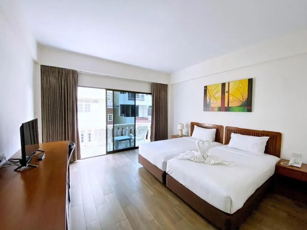 Bed in Paisiri Hotel