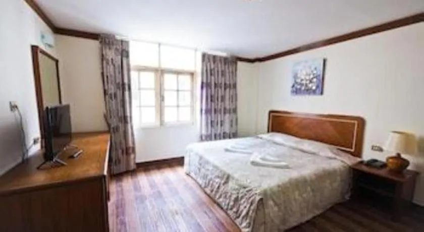 Bed in Paisiri Hotel