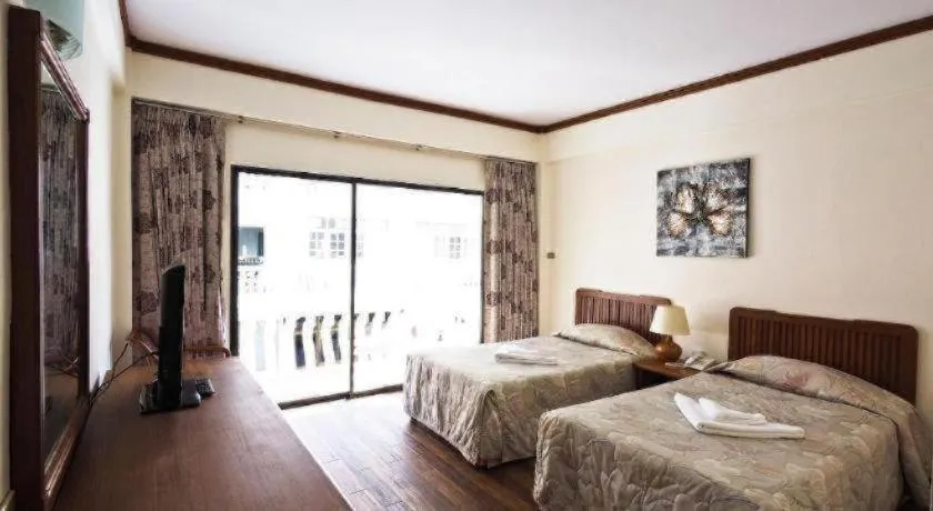 Bed in Paisiri Hotel