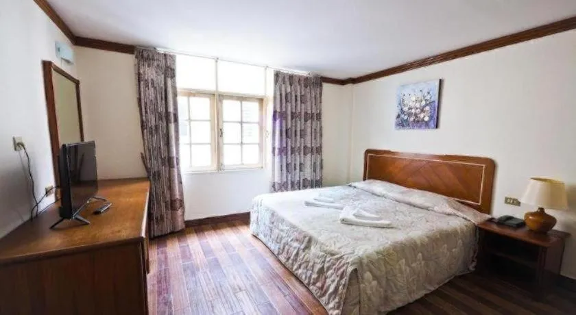 Bed in Paisiri Hotel