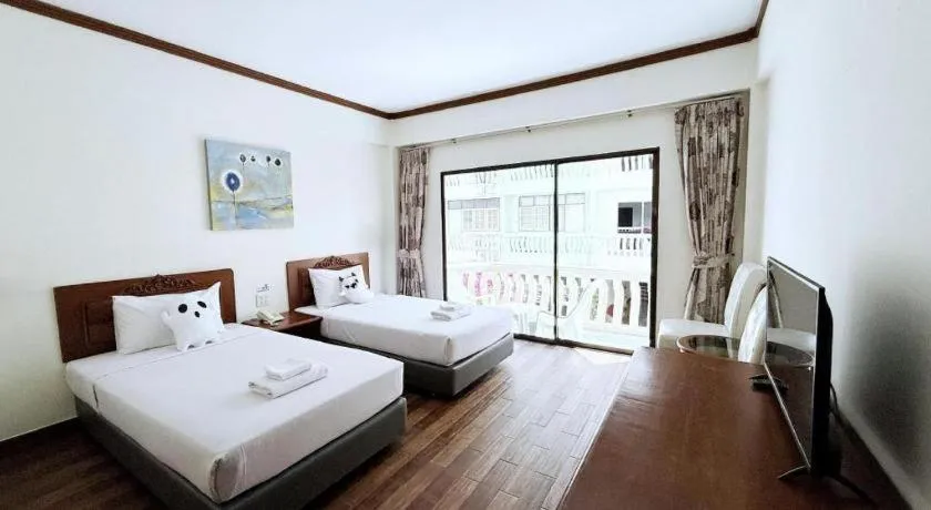 Bed in Paisiri Hotel