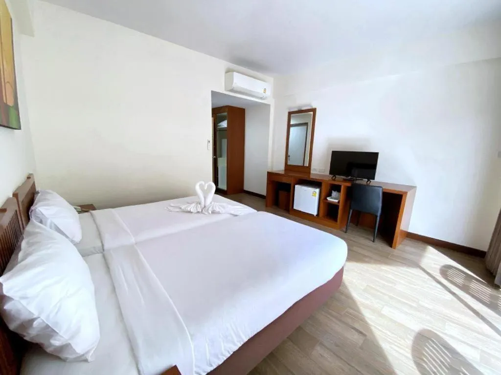 Bed in Paisiri Hotel