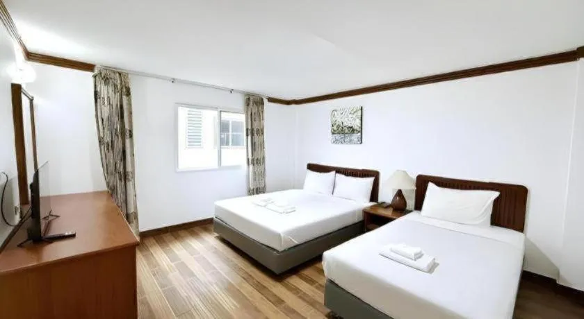 Bed in Paisiri Hotel