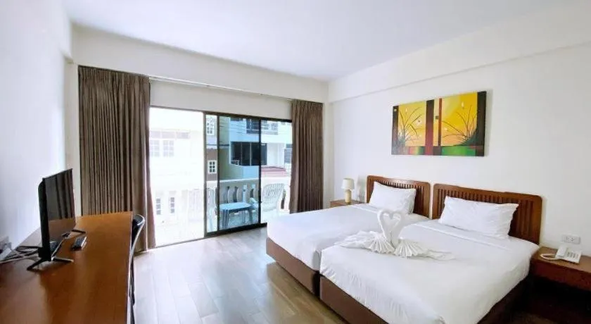 Bed in Paisiri Hotel