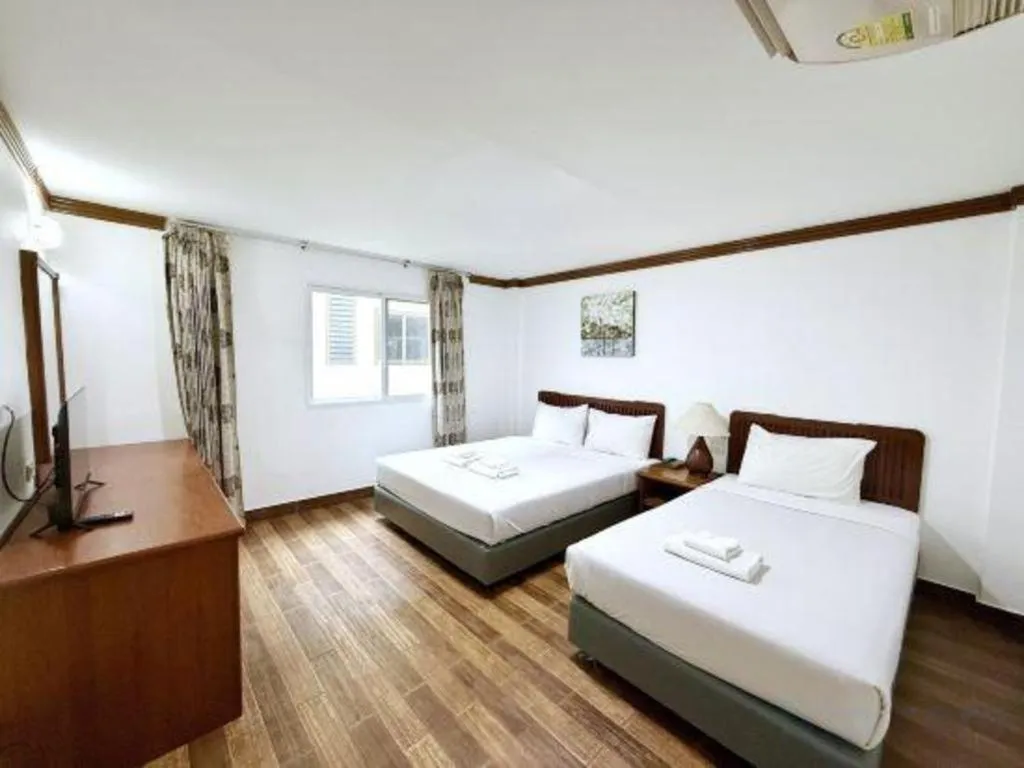 Bed in Paisiri Hotel