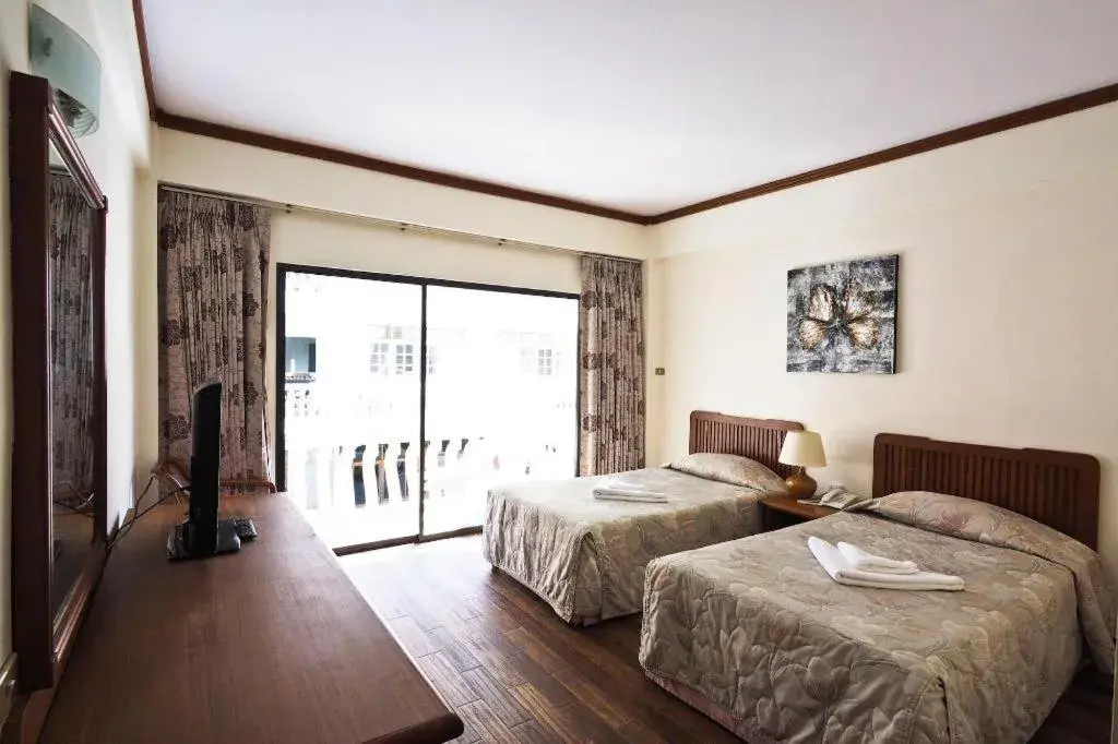 Bed in Paisiri Hotel Bed in Paisiri Hotel