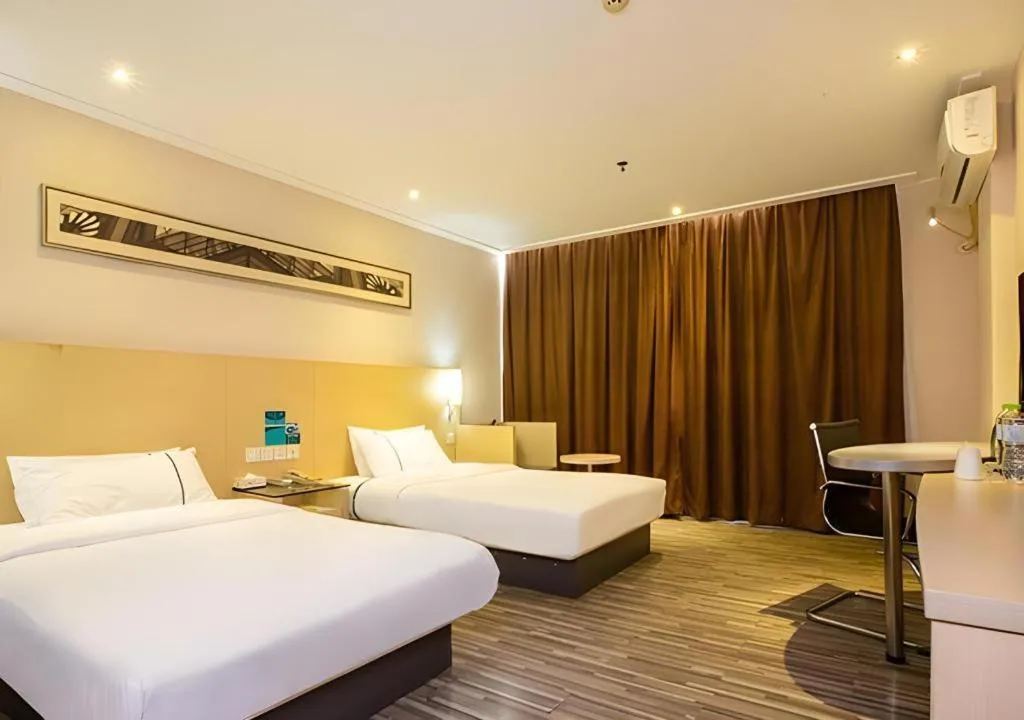 Bed in City Comfort Inn Guiping Xishan