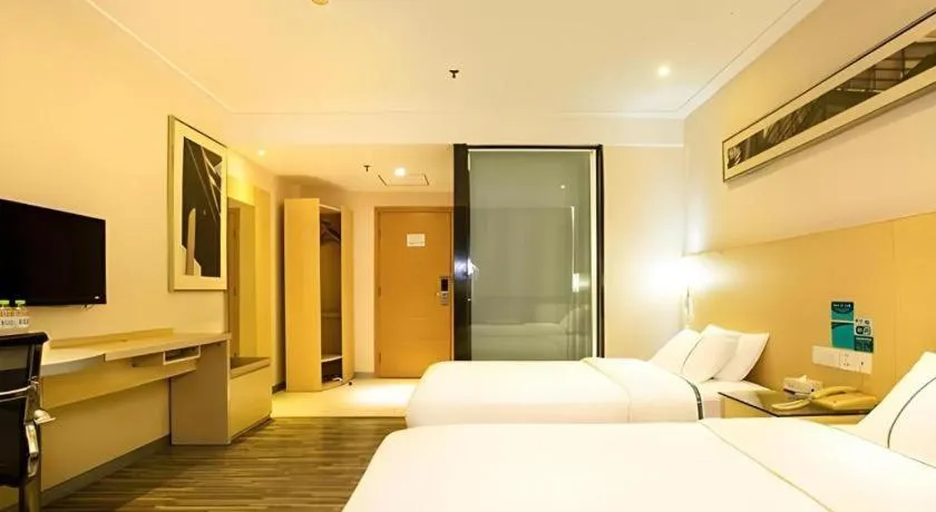 Bed in City Comfort Inn Guiping Xishan