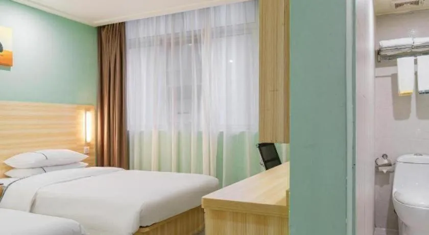 Bed in City Comfort Inn Guiping Xishan