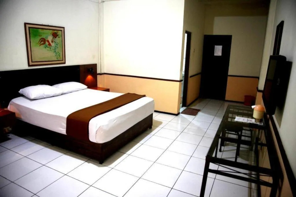 Bed in Hotel Augusta Jakarta