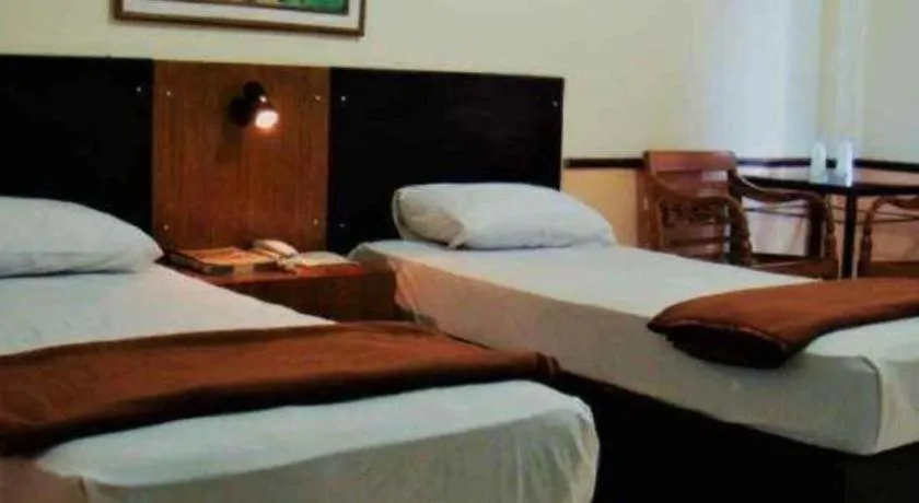 Bed in Hotel Augusta Jakarta