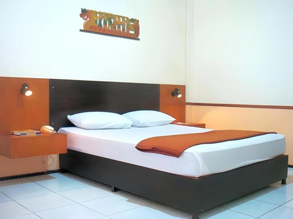 Bed in Hotel Augusta Jakarta