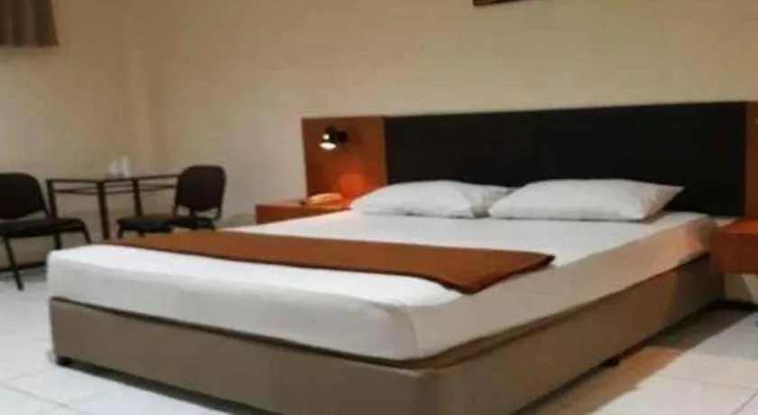 Bed in Hotel Augusta Jakarta