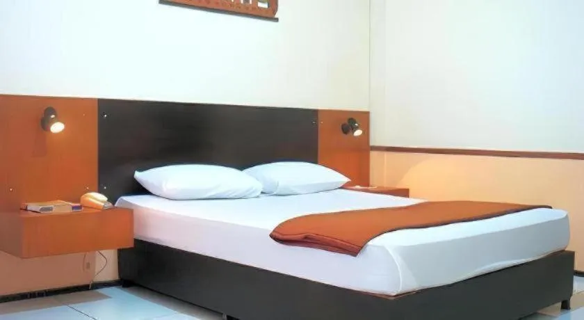 Bed in Hotel Augusta Jakarta